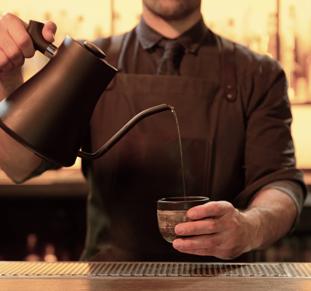 Bartender Pouring A Drink